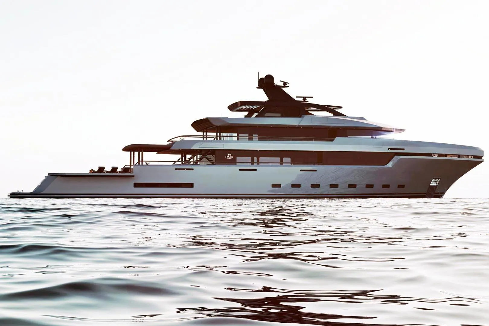 Luxurious RMK Yachts Orca 58M, 2026 model, cruising on calm waters at sunset.