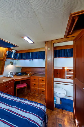Grande Jete Yacht Photos Pics Interior of 1990 Grand Banks 46 Classic yacht with wood furnishings and cozy cabin layout.