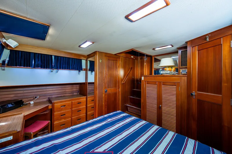 Grande Jete Yacht Photos Pics Luxurious wooden interior of a 1990 Grand Banks 46 Classic yacht cabin.