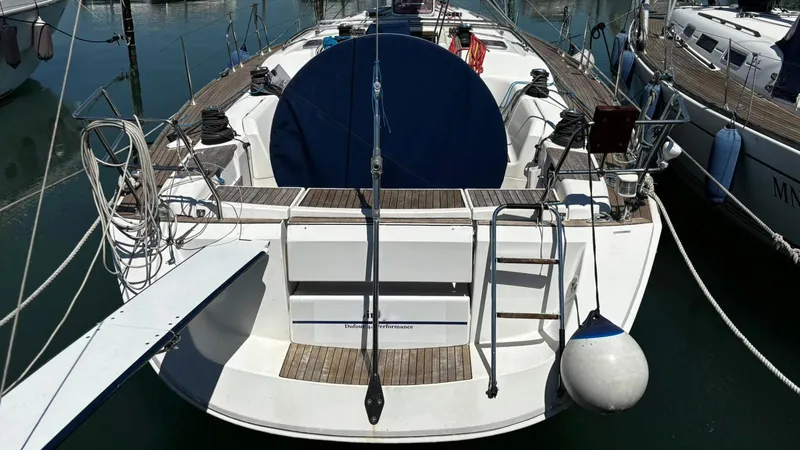 4746 Yacht Photos Pics 2006 Dufour 44 Performance sailboat docked, featuring spacious deck and sleek design.