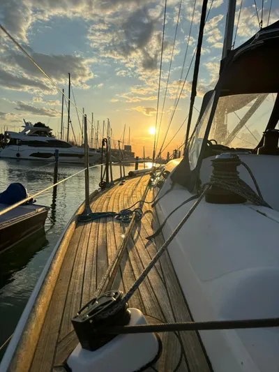 4746 Yacht Photos Pics Sailing yacht Dufour 44 Performance, 2006, docked at sunset with scenic marina view.