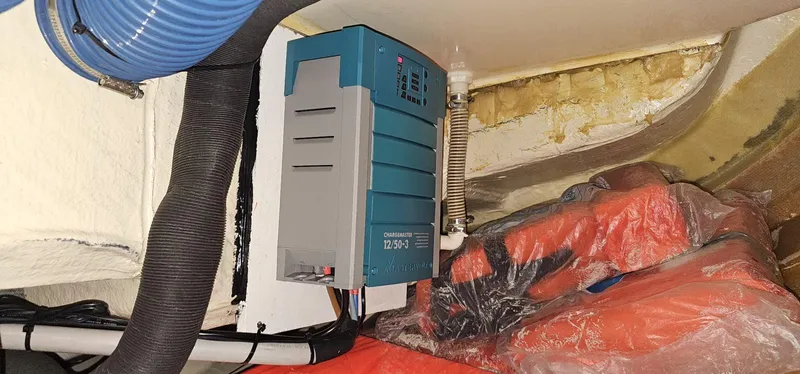 4746 Yacht Photos Pics Electrical system inside a 2006 Dufour 44 Performance yacht, featuring wiring and equipment.