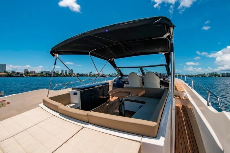 Amaretto Yacht Photos Pics 2015 Absolute 40 STL yacht with spacious deck and canopy on a sunny day.