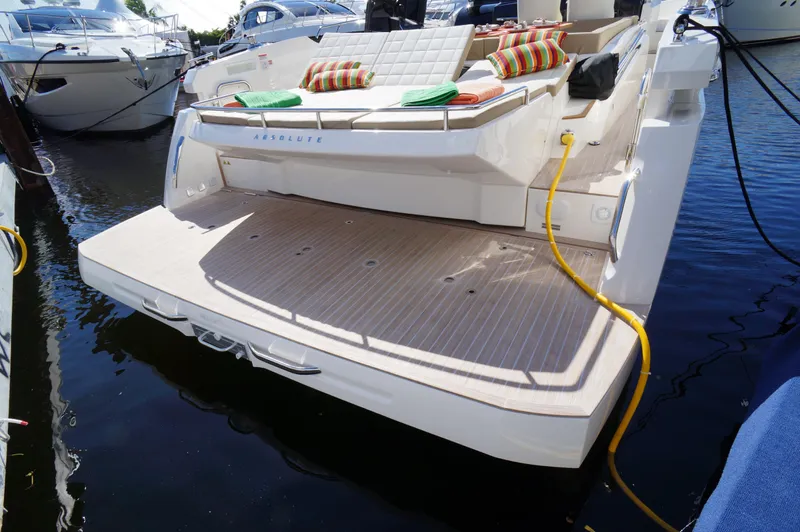 Amaretto Yacht Photos Pics 2015 Absolute 40 STL yacht with spacious swim platform and cushioned seating.
