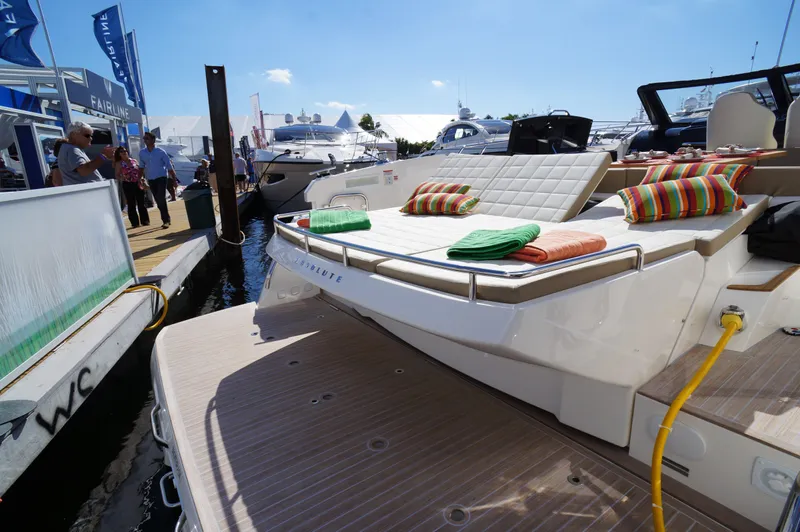 Amaretto Yacht Photos Pics 2015 Absolute 40 STL yacht with sunbathing area at a marina.