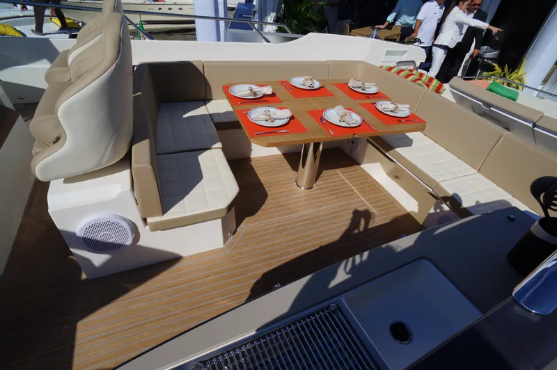 Amaretto Yacht Photos Pics 2015 Absolute 40 STL yacht dining area with table set for four.