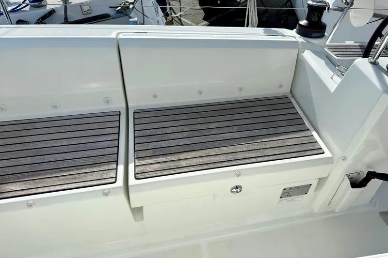  Yacht Photos Pics Beneteau Oceanis 35.1 2021 yacht cockpit with sleek wooden seating.