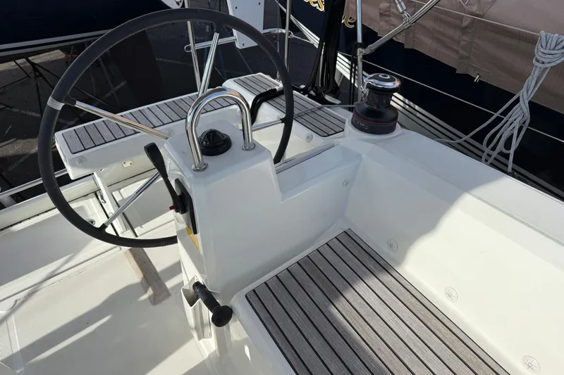  Yacht Photos Pics Cockpit of 2021 Beneteau Oceanis 35.1 sailboat with steering wheel and winch.