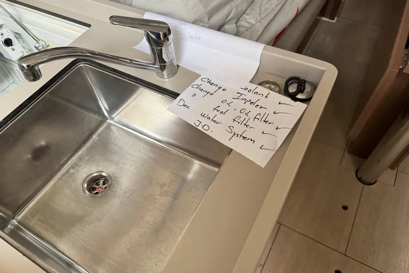  Yacht Photos Pics Beneteau Oceanis 35.1 yacht kitchen sink with maintenance checklist, 2021 model.