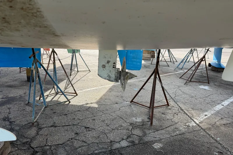  Yacht Photos Pics Beneteau Oceanis 35.1 sailboat hull on stands, 2021 model, in dry dock.