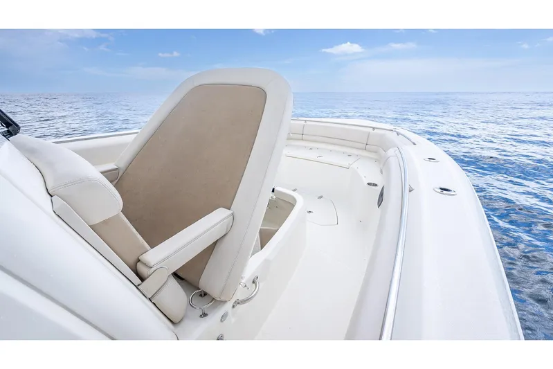 330 Boston Whaler Yacht Photos Pics 2017 Boston Whaler 330 Outrage boat interior with seating, ocean view, and clear sky.