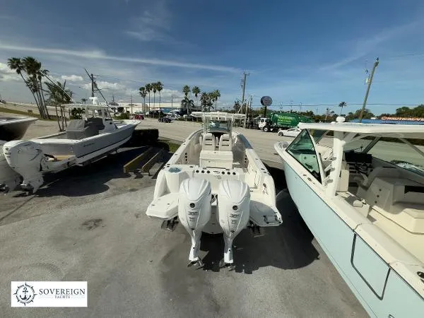312-027 Yacht Photos Pics 2024 Sailfish 312 boat with dual engines displayed at Sovereign Yachts dealership.
