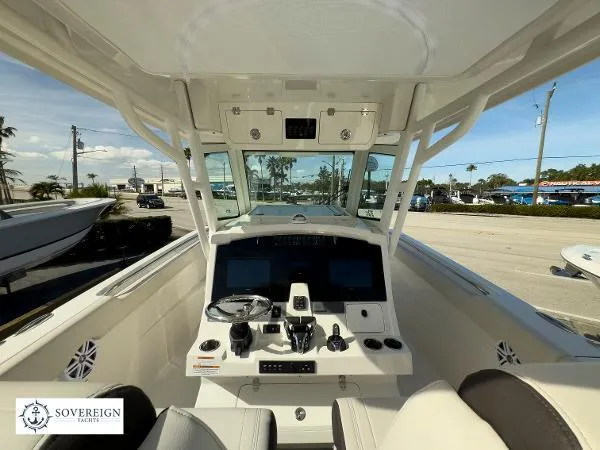 312-027 Yacht Photos Pics 2024 Sailfish 312 boat cockpit with advanced navigation controls and seating, displayed by Sovereign Yachts.