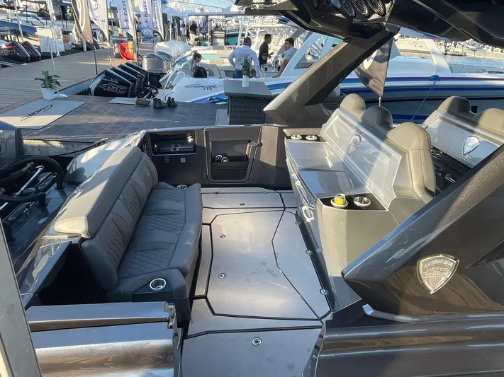 C Daze Yacht Photos Pics 2024 Adrenaline 47 Reaper boat interior with sleek seating and modern design.