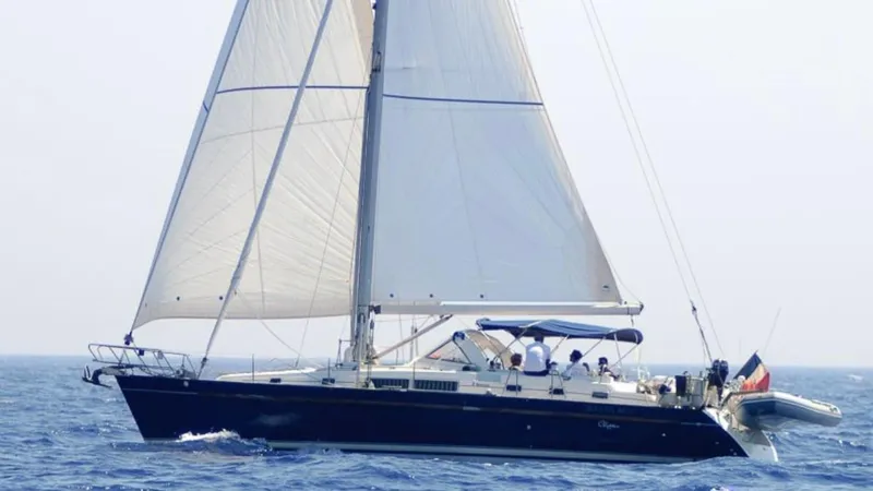 1730 Yacht Photos Pics Sailing yacht Beneteau Oceanis Clipper 44 CC, 1999 model, cruising on open sea.