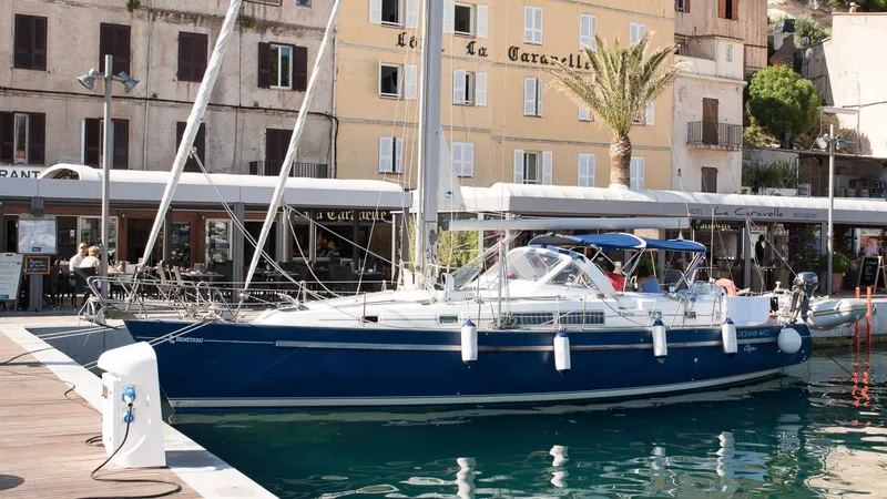 1730 Yacht Photos Pics Beneteau Oceanis Clipper 44 CC yacht docked at a marina, 1999 model.