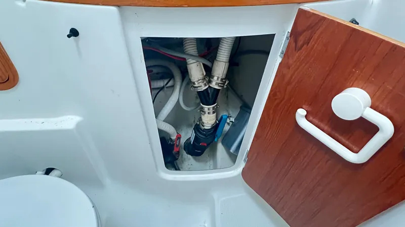 1730 Yacht Photos Pics Interior plumbing of a 1999 Beneteau Oceanis Clipper 44 CC sailboat.