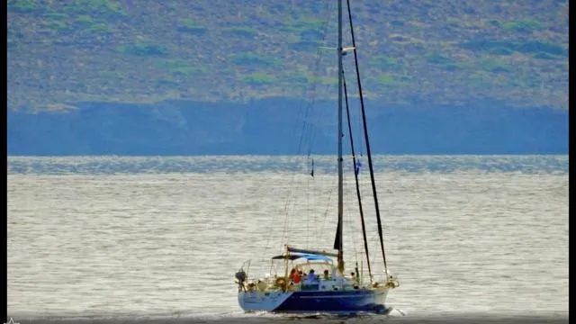 1730 Yacht Photos Pics Sailing yacht Beneteau Oceanis Clipper 44 CC, 1999 model, cruising on calm waters.