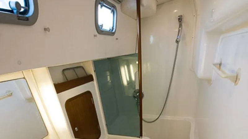 1730 Yacht Photos Pics Interior of 1999 Beneteau Oceanis Clipper 44 CC yacht bathroom with shower.