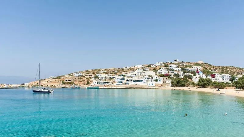 1730 Yacht Photos Pics Sailboat Beneteau Oceanis Clipper 44 CC, 1999, anchored near scenic coastal village.