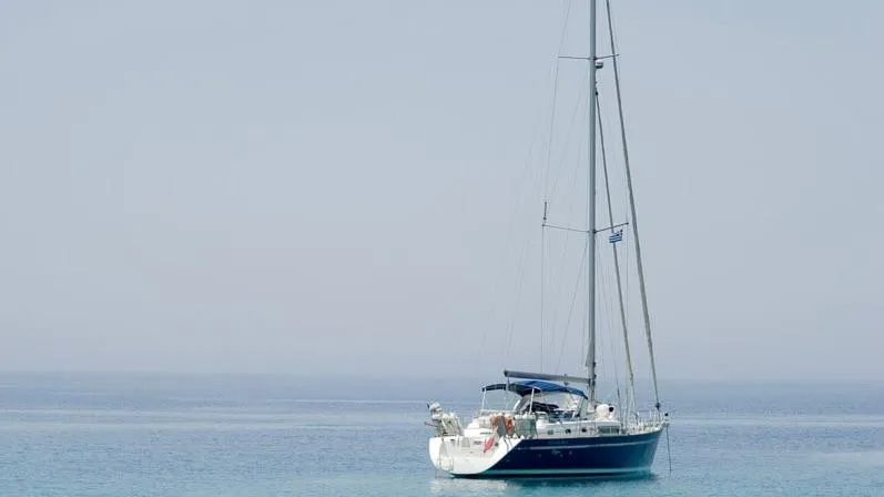 1730 Yacht Photos Pics Sailing yacht Beneteau Oceanis Clipper 44 CC, 1999, anchored on calm sea.