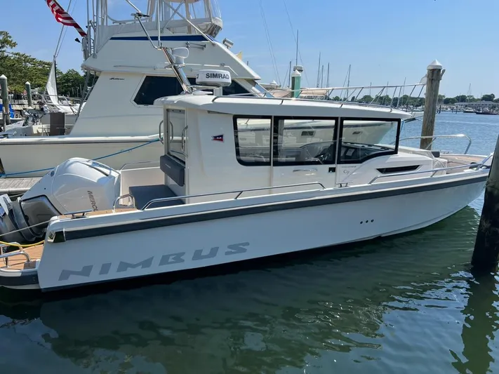 Crosswinds Yacht Photos Pics 2023 Nimbus C9 boat docked at marina.