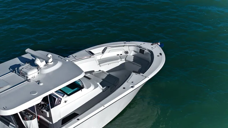  Yacht Photos Pics Bertram 39 CC 2023 boat on calm water.