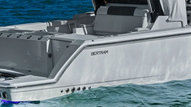  Yacht Photos Pics 2023 Bertram 39 CC boat on calm water.