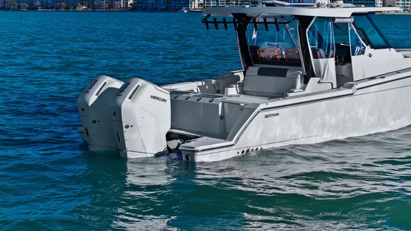  Yacht Photos Pics 2023 Bertram 39 CC boat on calm water.