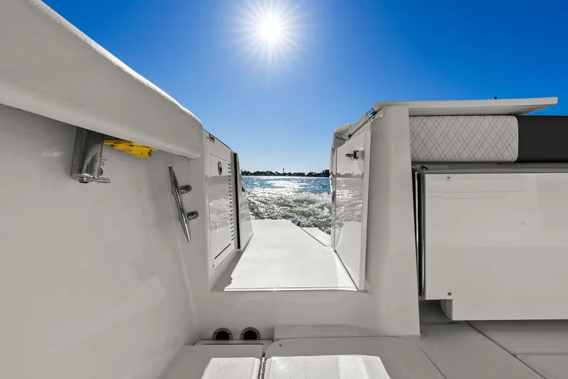  Yacht Photos Pics Bertram 39 CC 2023 boat with sunny ocean view.