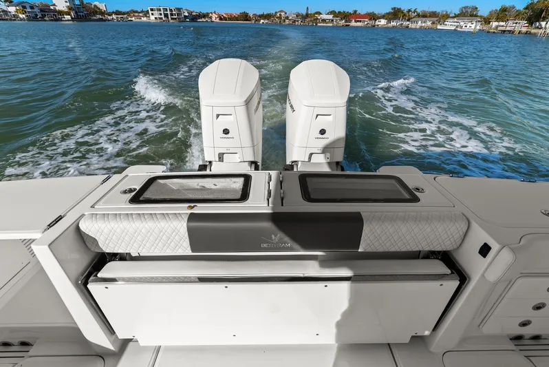  Yacht Photos Pics Bertram 39 CC 2023 with twin outboard engines on the water.