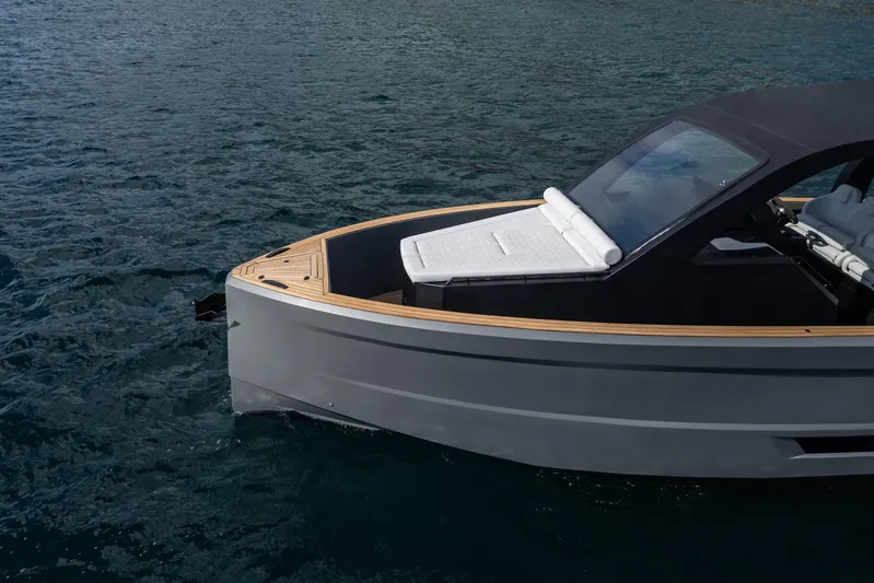 Max 43 Comfort Yacht Photos Pics Sleek 2025 Maxim Yachts 43 Comfort on tranquil water, featuring modern design and luxury.