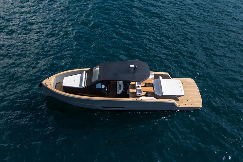 Max 43 Comfort Yacht Photos Pics 2026 Maxim Yachts 43 on open water, featuring sleek design and spacious deck.