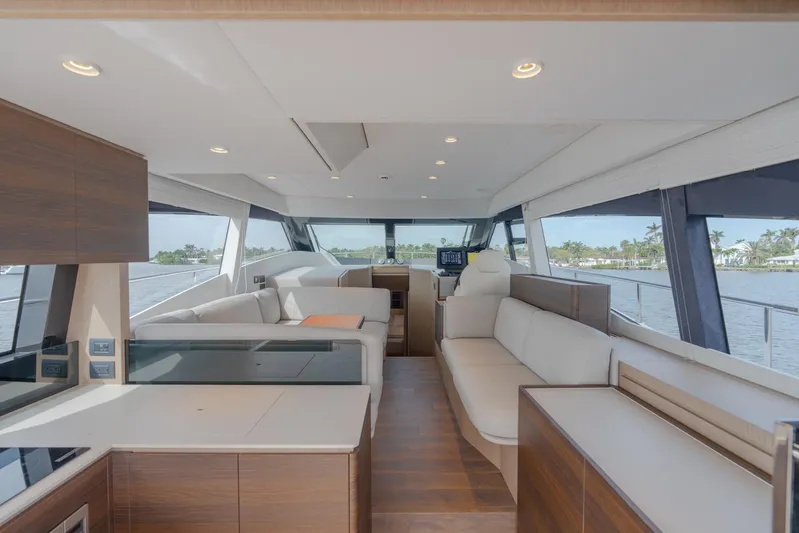 Cecilonga Yacht Photos Pics Interior of 2023 Ferretti Yachts 50 FLY, modern design with panoramic windows.