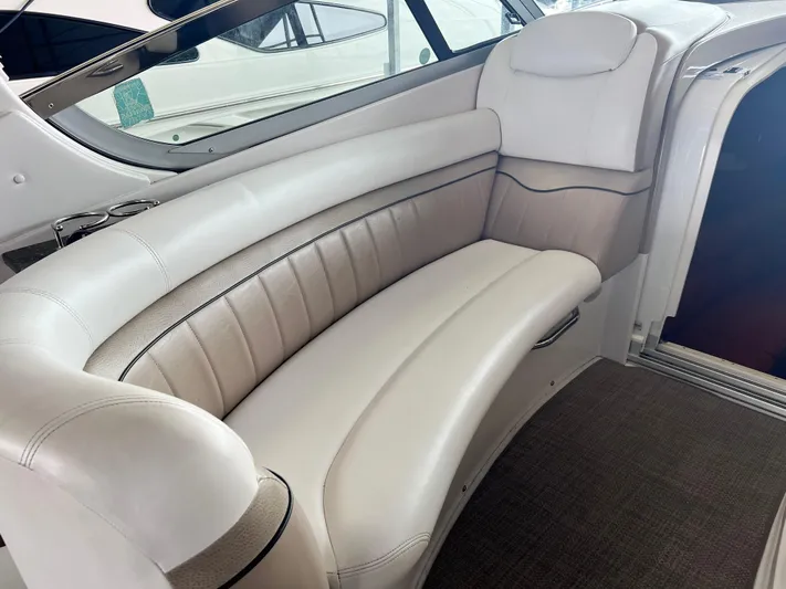 Ruby Yacht Photos Pics Luxurious white leather seating in 2007 Four Winns 358 Vista boat interior.