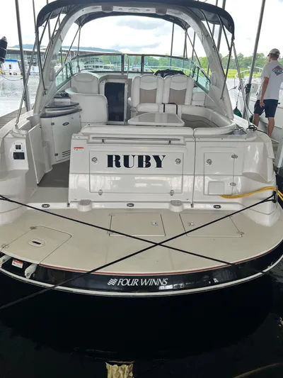 Ruby Yacht Photos Pics 2007 Four Winns 358 Vista boat named "RUBY" docked at a marina.