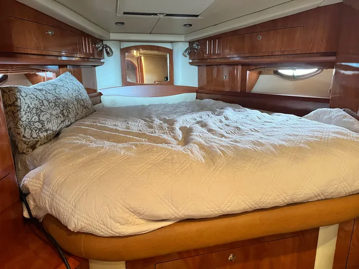 Ruby Yacht Photos Pics Luxurious cabin interior of 2007 Four Winns 358 Vista yacht with cozy bedding.