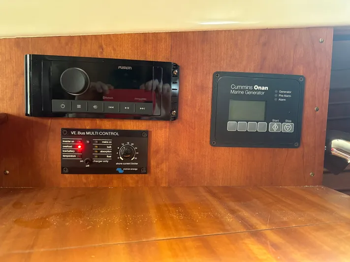 Amanti De Gaja Yacht Photos Pics Control panel of a 2009 Hinckley Picnic Boat 37 MKIII with audio and generator systems.