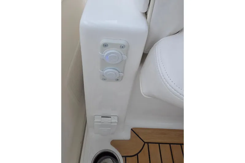 Salty Bear Yacht Photos Pics 2022 Albemarle 36 Express boat interior detail with white seating and wood flooring.