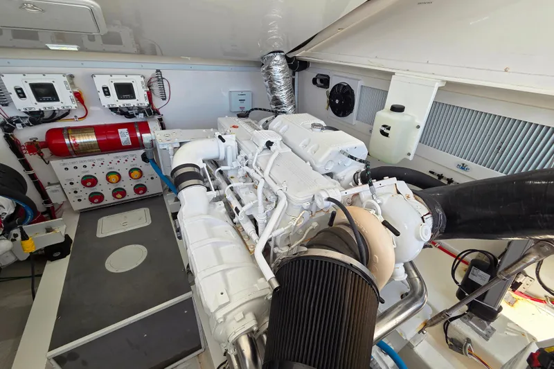 Salty Bear Yacht Photos Pics Engine room of 2022 Albemarle 36 Express boat, featuring advanced machinery and control panels.