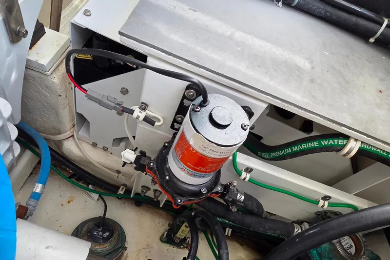 Salty Bear Yacht Photos Pics Engine compartment of 2022 Albemarle 36 Express boat, showcasing marine water system components.