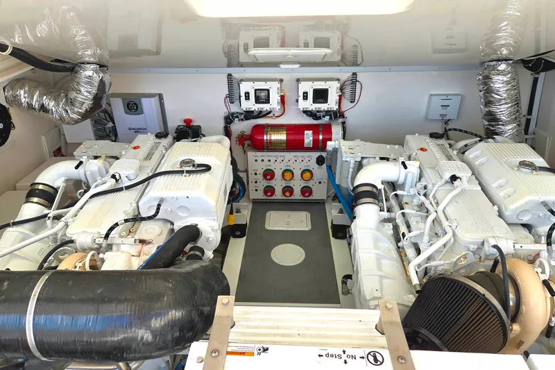 Salty Bear Yacht Photos Pics Engine room of 2022 Albemarle 36 Express with dual engines and control systems.