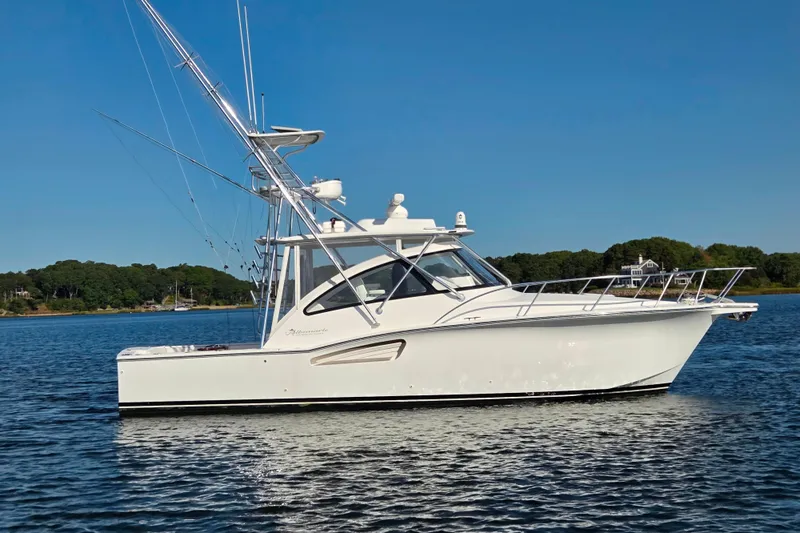 Salty Bear Yacht Photos Pics 2022 Albemarle 36 Express boat on calm water under clear blue sky.