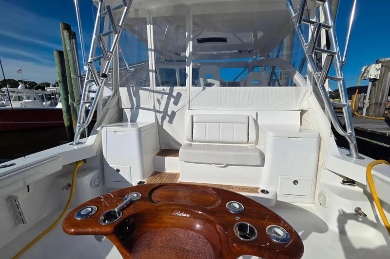 Salty Bear Yacht Photos Pics 2022 Albemarle 36 Express boat interior with seating and fishing station.