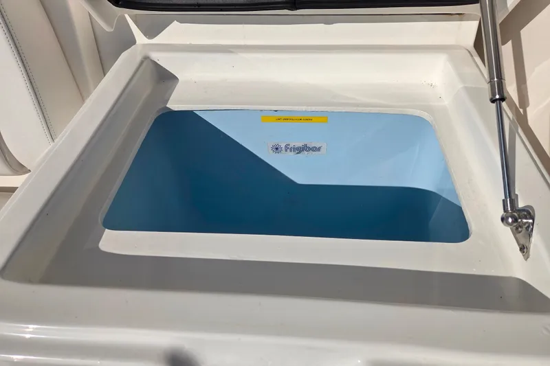 Salty Bear Yacht Photos Pics Albemarle 36 Express 2022 boat cooler compartment with Frigibar branding.