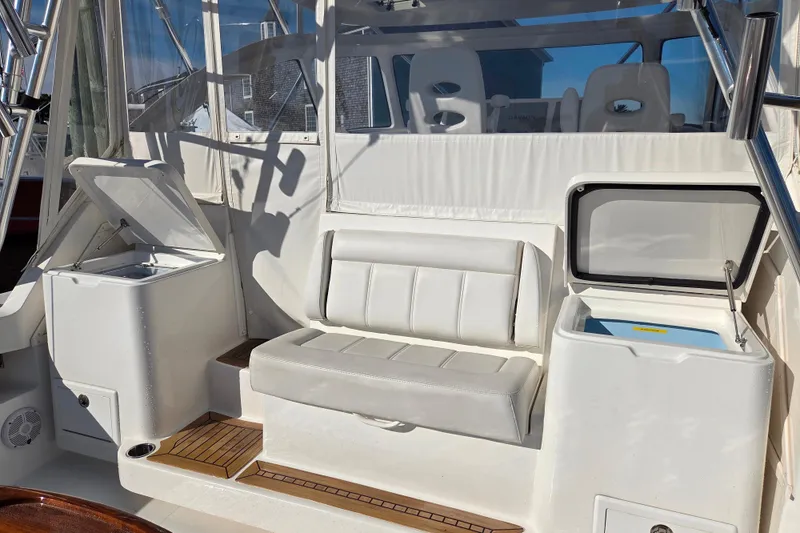 Salty Bear Yacht Photos Pics 2022 Albemarle 36 Express boat interior with seating and storage compartments.
