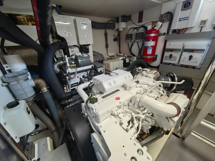  Yacht Photos Pics Engine room of 2021 Monte Carlo MC6 yacht, featuring advanced machinery and safety equipment.