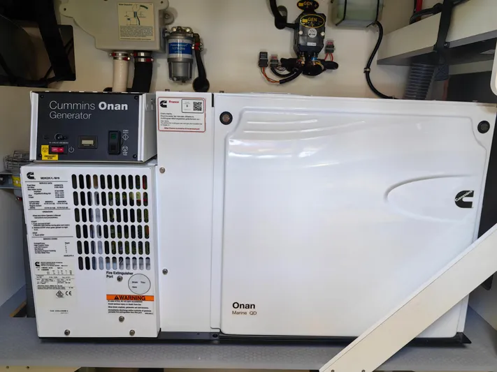  Yacht Photos Pics Cummins Onan generator in a 2021 Monte Carlo MC6, installed in a utility compartment.