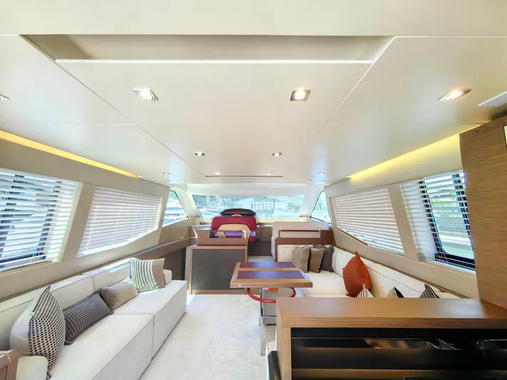  Yacht Photos Pics Luxurious interior of 2021 Monte Carlo MC6 yacht with modern seating and elegant design.