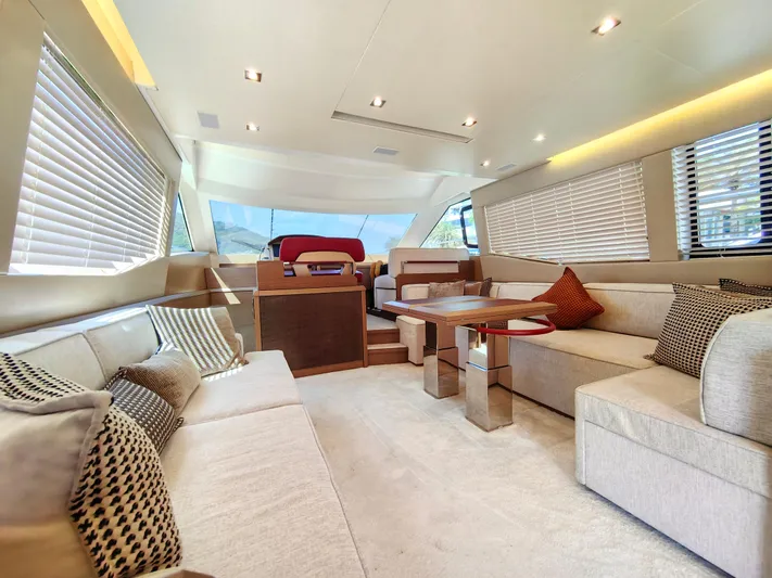  Yacht Photos Pics Luxurious interior of 2021 Monte Carlo MC6 yacht with elegant seating and modern design.